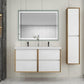 A modern wall-mounted Fiora bathroom vanity with double sinks and a sleek design, featuring white drawers and a white countertop with a gray vein finish.