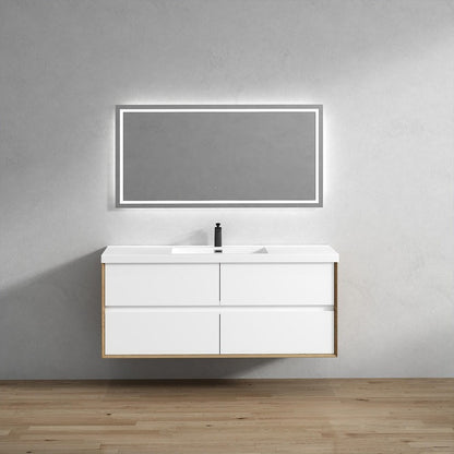 A wall-mounted, single sink bathroom vanity with a white finish and gold accents, featuring a rectangular mirror and a modern design.