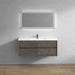 Wall-mounted Fiora bathroom vanity with a single sink, featuring a wood veneer finish and a rectangular chrome overflow. The vanity is positioned against a white wall with a modern mirror above it.