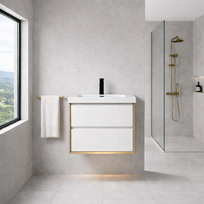Modern bathroom with a white vanity, gold fixtures, and a view of greenery outside the window.