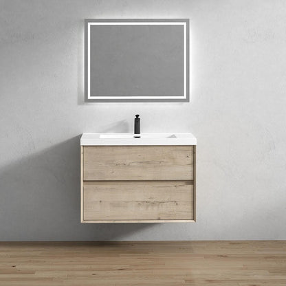 Wall-mounted bathroom vanity with a rectangular mirror and a single sink, finished in a light wood color, mounted on a gray wall with a recessed lighting fixture above.